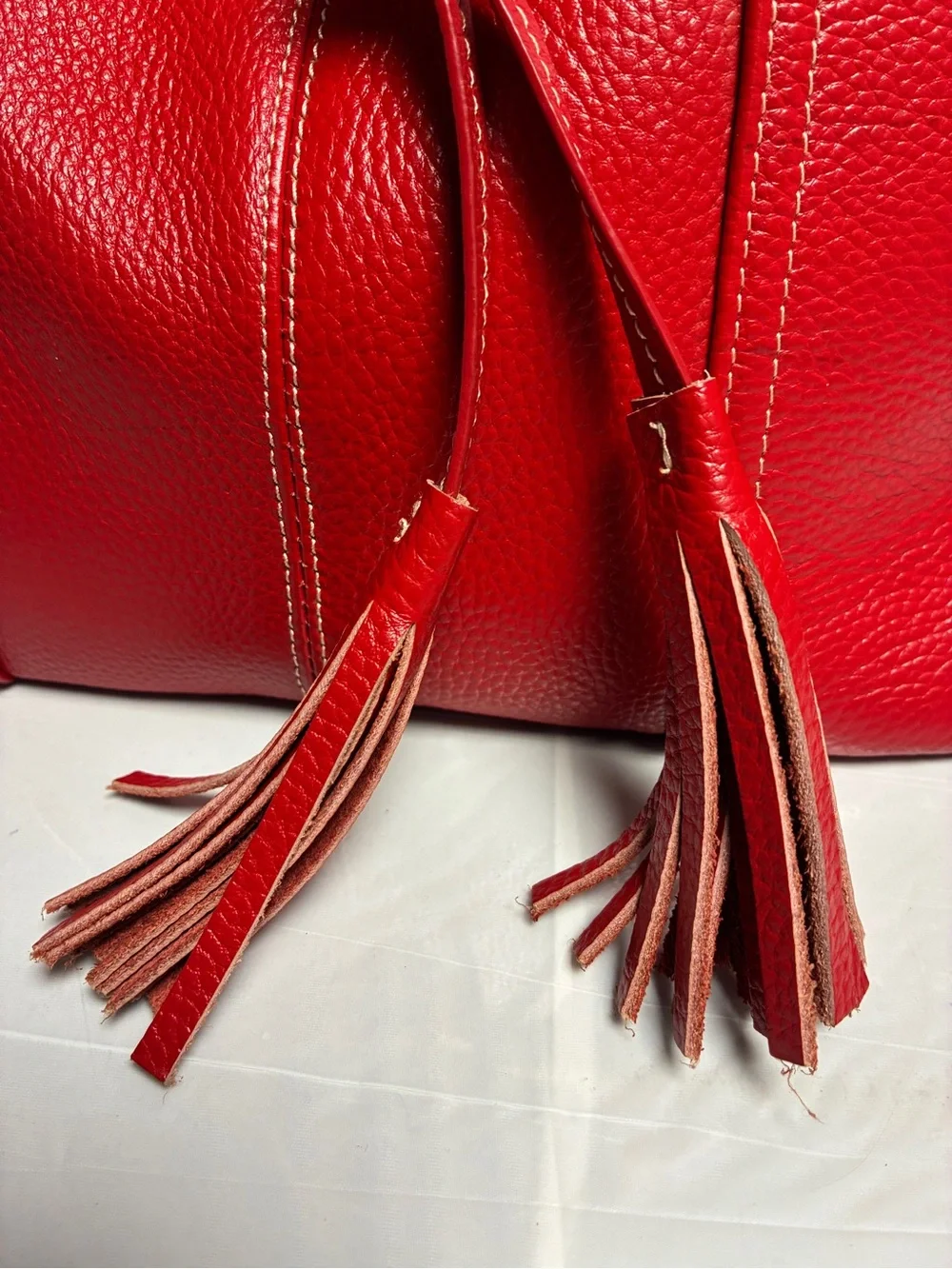 LAGGO Andrea Pebbled Leather Hobo Shoulder Bag Red Tassel Front Pockets Large
